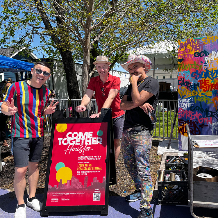 Donald Rabin, Courntey Crappell and artist GONZO247 at the Lyons Avenue Festival
